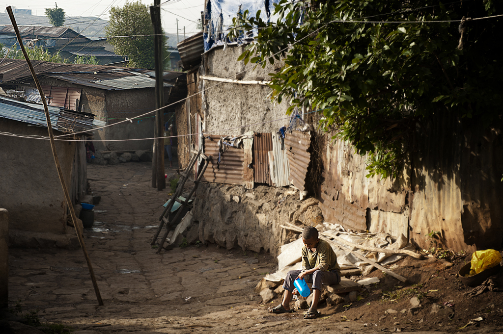 Daily cleaning in a Piassa informal settlement, which will be cleared soon